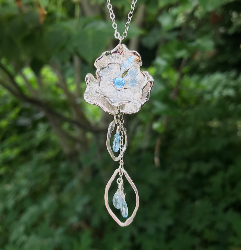 Blue topaz gemstone handmade poppy flower necklace by Garden of Silver.