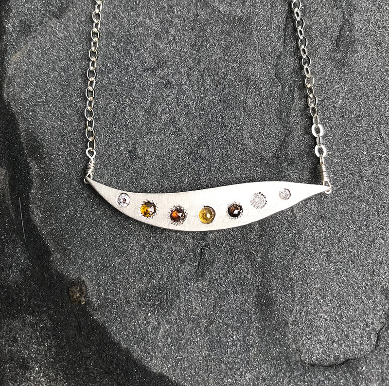 Sunset Wave Necklace handmade with brown, yellow and white diamonds and sterling silver by Garden of Silver in East Hampton.