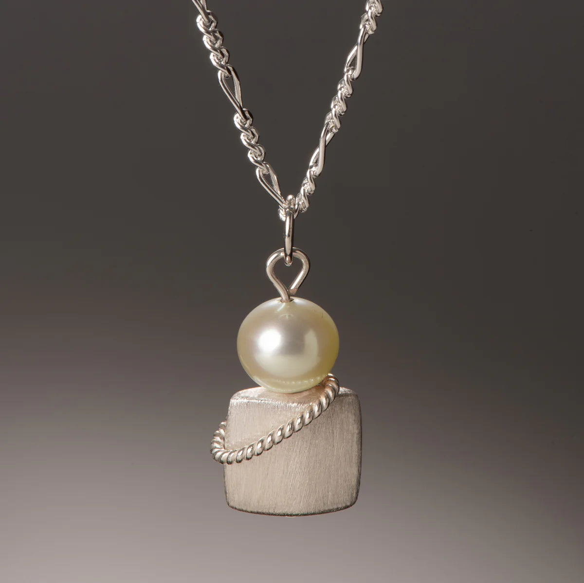 SS Babette Up V Twist Pearl Pendant by Naomi