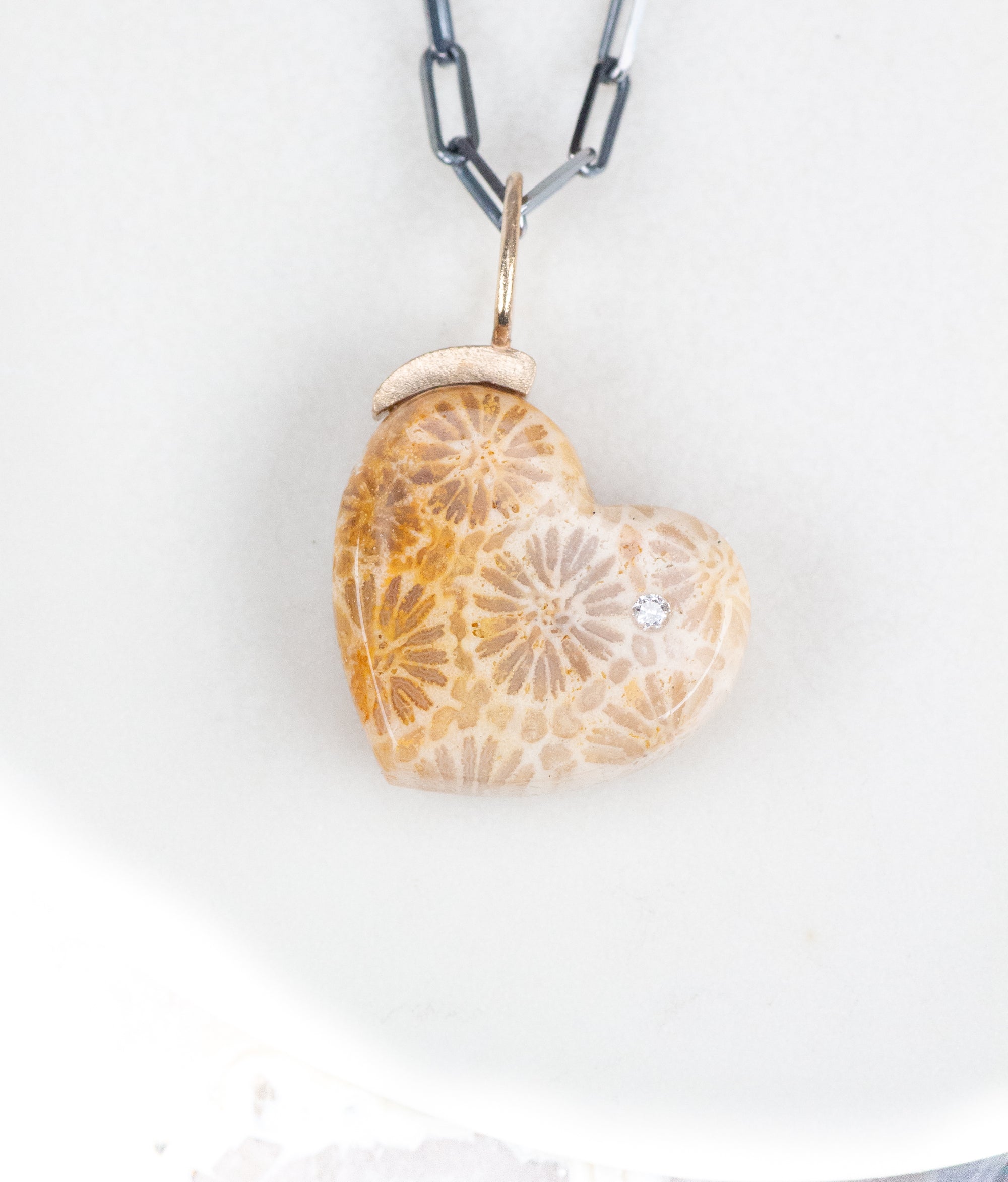 14K, Diamond & fossilized coral heart pendant by Karin Luvaas