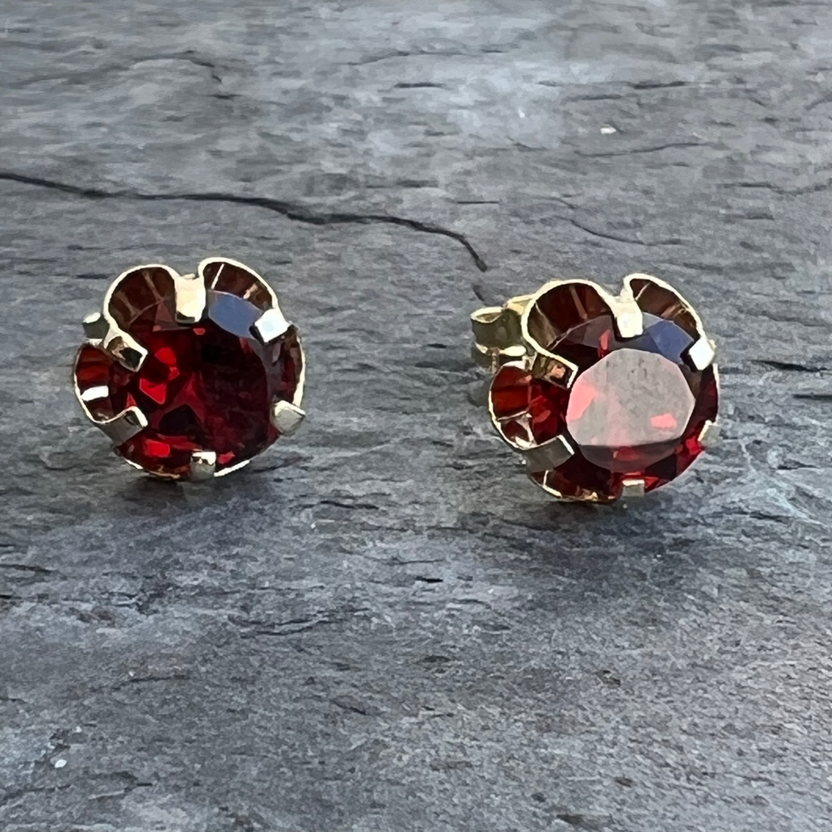 Garnet 14K gold studs at Garden of Silver in Westhampton Beach.