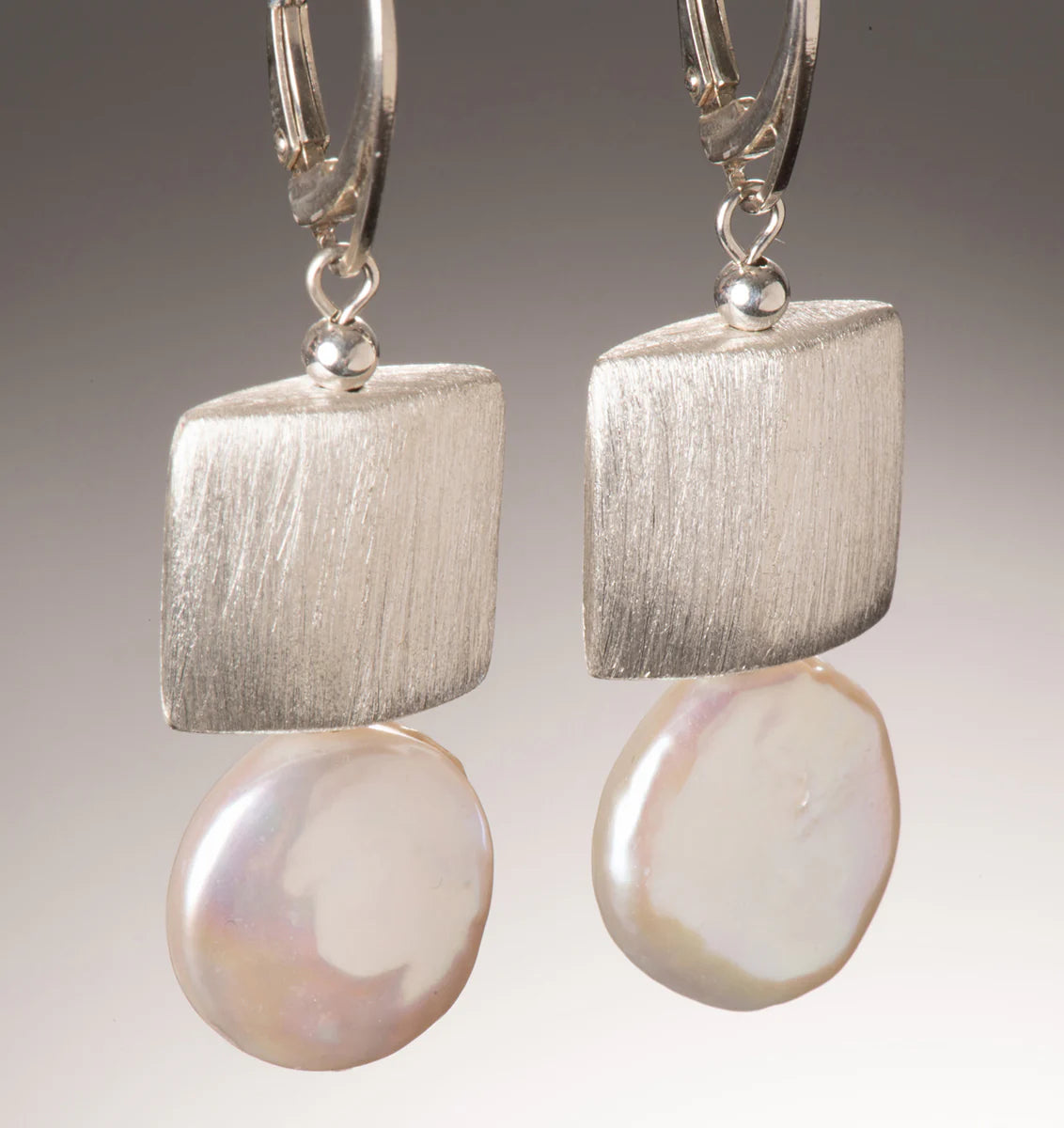 SS Streamline Earrings by Naomi