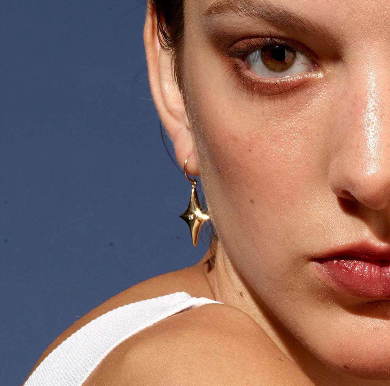 14k Gold Star Dangle Earrings set with White Diamonds Earrings by Jane Bartel
