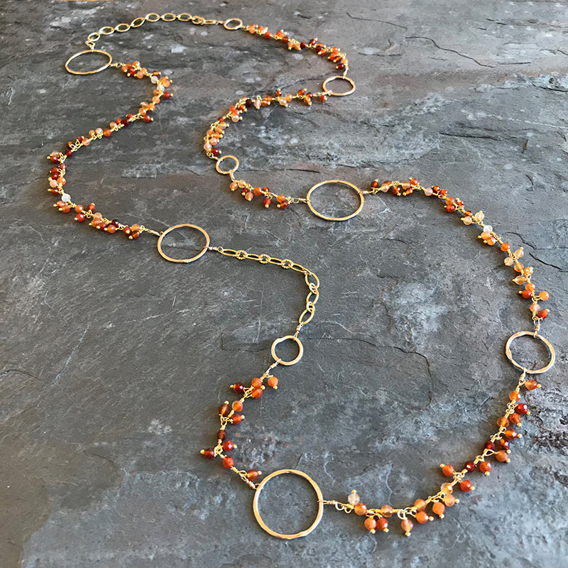 Fire Opal Moon Necklace handmade by Garden of Silver and available at 77 Main Street, Westhampton Beach, New York