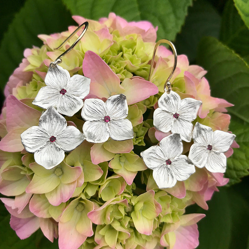 Ruby Hydrangea Earrings handmade in sterling silver with ruby gemstones by Garden of Silver.