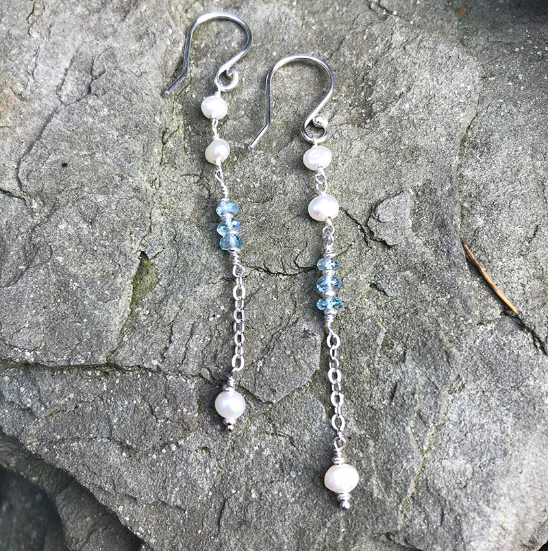 Sea Treasures Earrings handmade by Garden of Silver with pearls and blue zircon gemstones and sterling silver.
