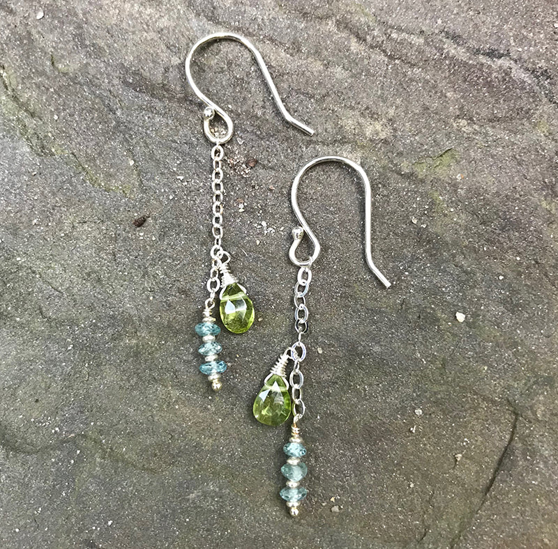 Napeague Bay Earrings handmade by Garden of Silver with sterling silver, peridot and blue zircon gemstones.