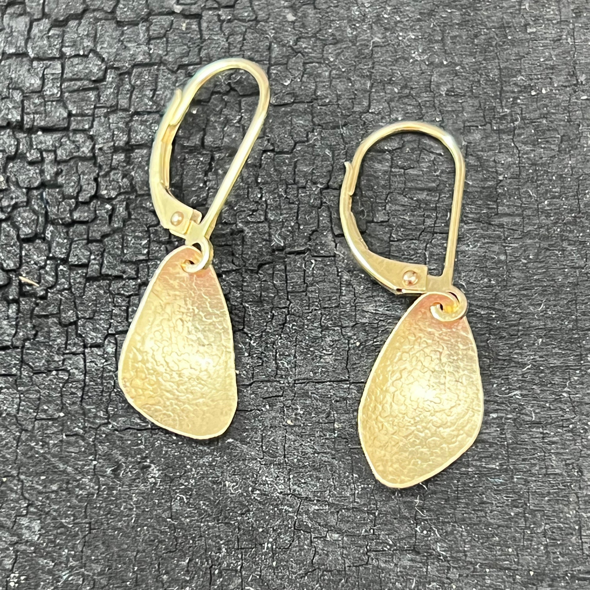 Tiny 14K gold wings earrings by Garden of Silver in Westhampton Beach. www.gardenofsilver.com