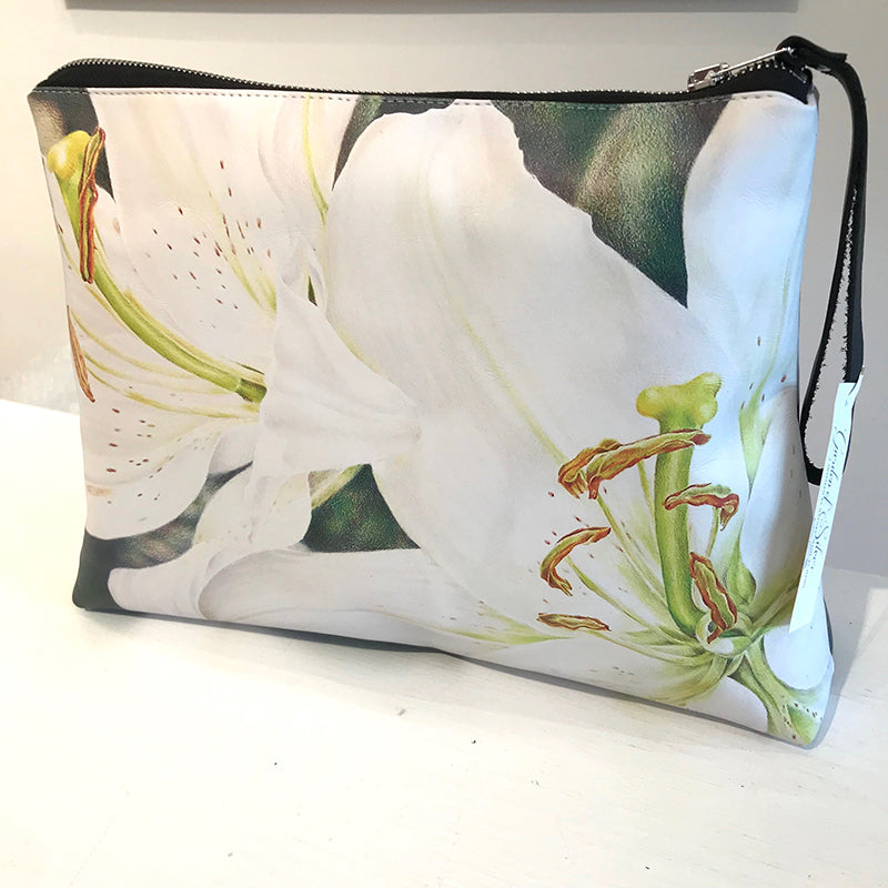 Lily Pair large clutch handmade in Italian nappa leather. Colored pencil artwork by Eileen Baumeister McIntyre. 77 Main Street, Westhampton Beach, NY.