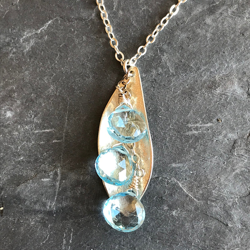Topaz Rain Necklace handmade in sterling silver and blue topaz gemstones by Garden of Silver. Handmade in the USA.